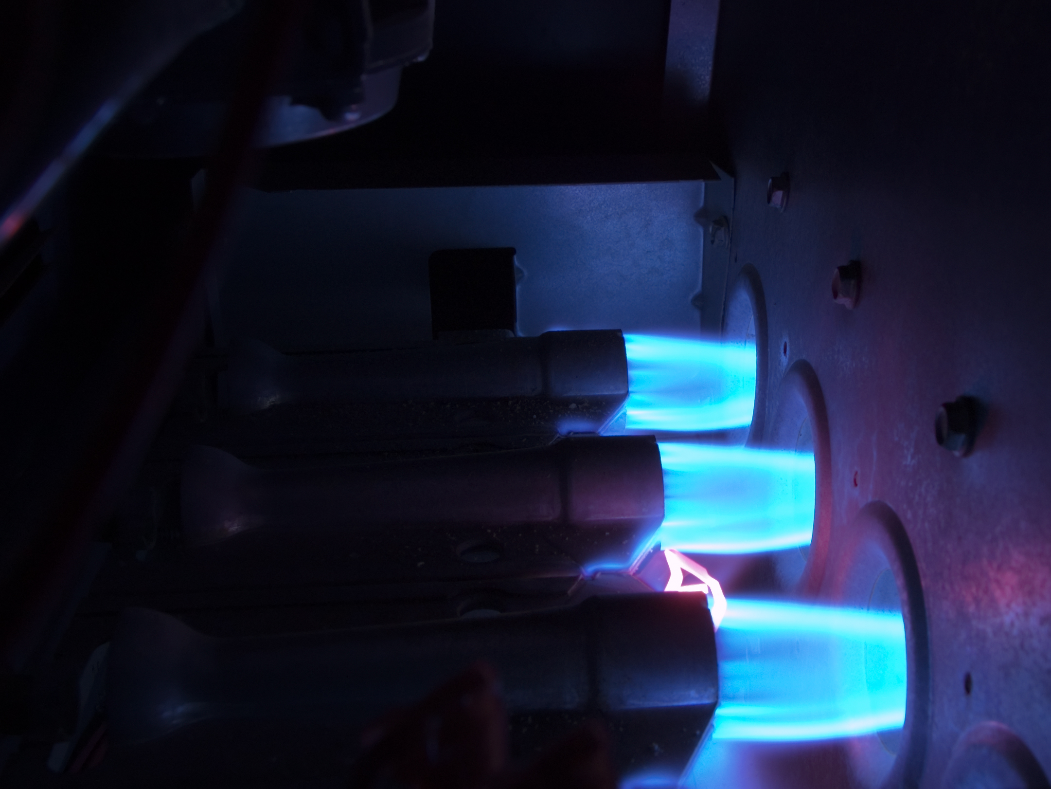 high temperature gas jets in an industrial burner