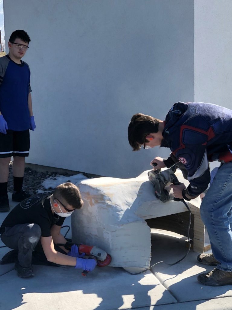 Sanding and grinding of the car continues.