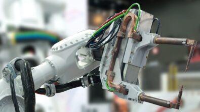 robot arm with spot welding tool piece