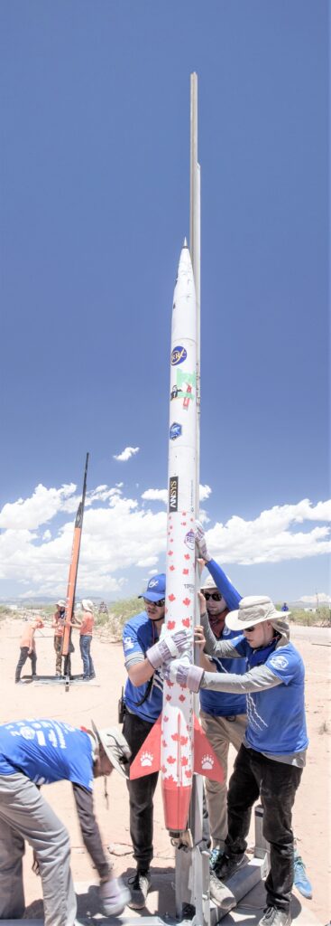 Student competition team working on rocket