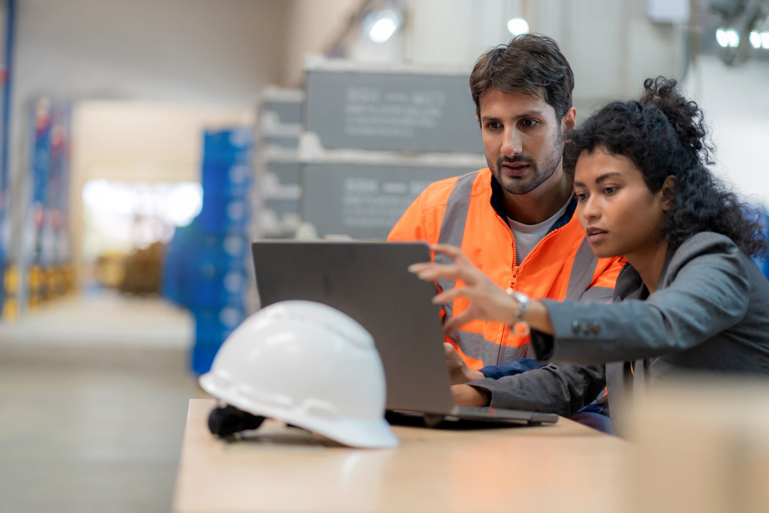 Product engineer and manufacturing engineer collaborate on a product change