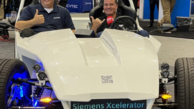 Image of Author Chris Pollack and Tony Gunn from MTDCNC taking a ride in the car that uses the parts detailed here.