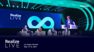 Panel of speakers on stage at a Realize LIVE event.