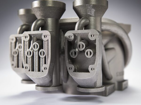 The synergy of simulation and additive manufacturing
