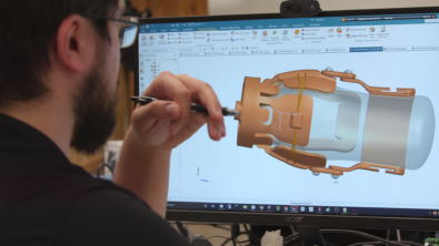 Engineer designing an additive manufactured prosthetic limb