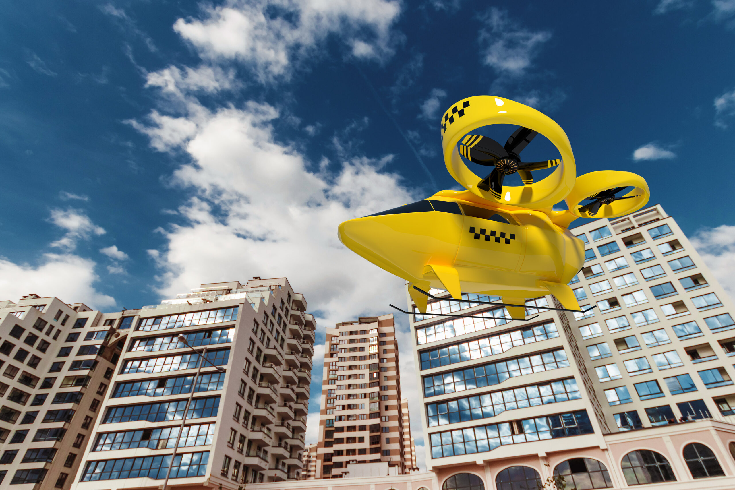 A yellow eVTOL air taxi flying in front of a city.