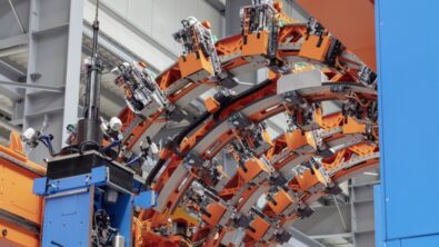 An automated assembly line for an early airframe.