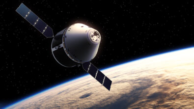 A 3D conceptual spacecraft orbiting above Earth, solar panels extended.