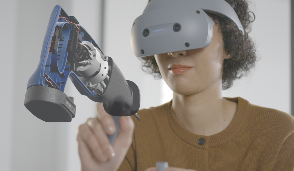 The image shows someone using the Sony HMD viewing a power hand tool. 