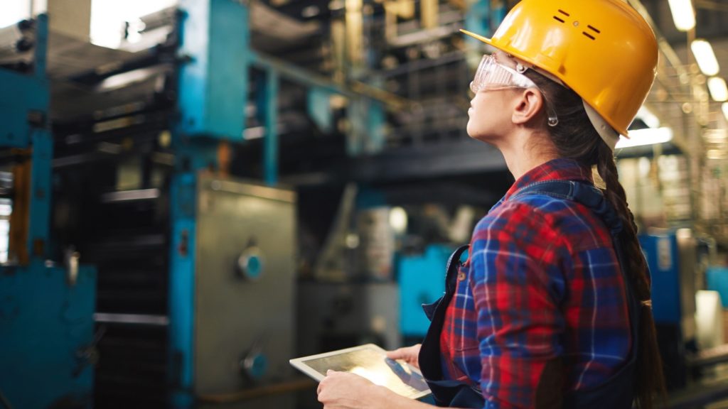 Woman working in factory setting