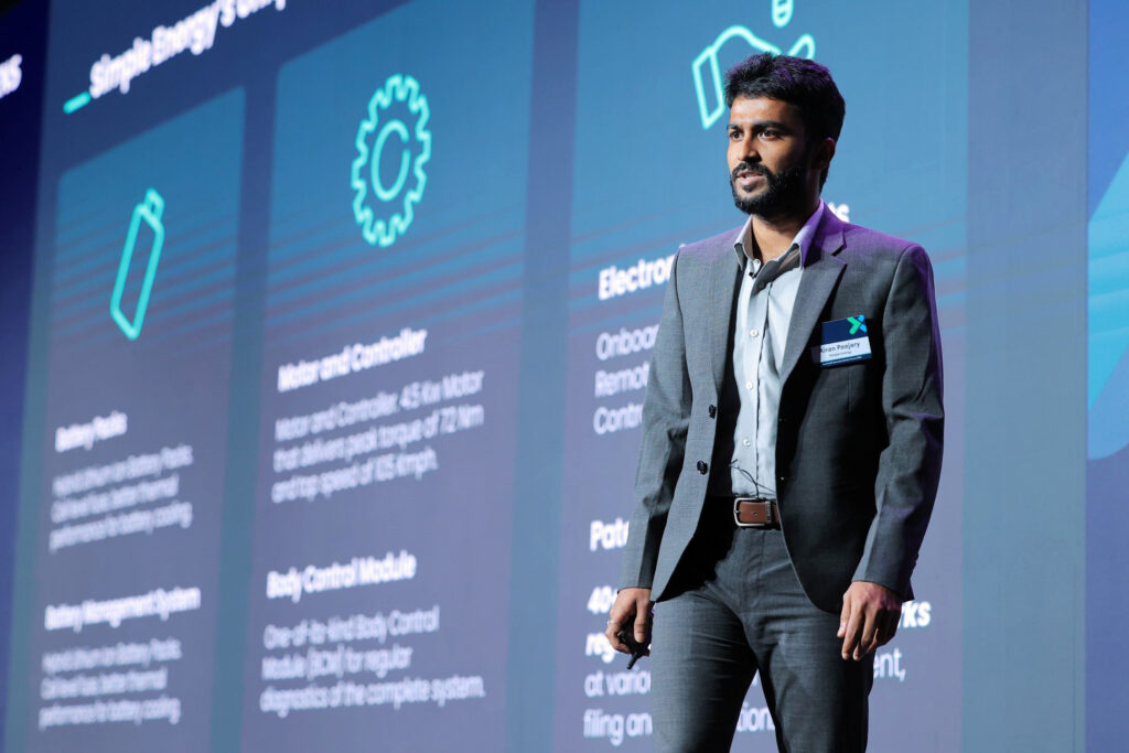 Kiran Poojari delivers a customer perspective to the crowd during a speech at the Asia Pacific Converge event last month.