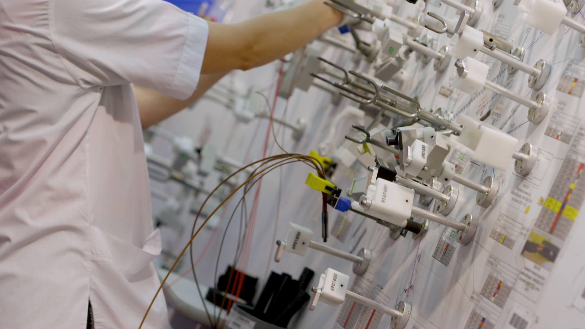 a person working on a harness formboard