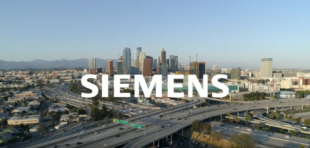 A city skyline with the word Siemens