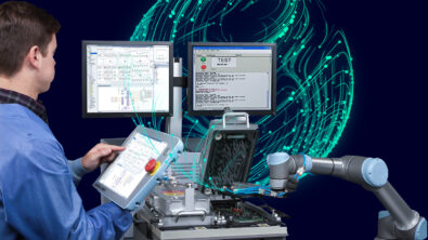 Test engineer using automated PCB testing software with two screens