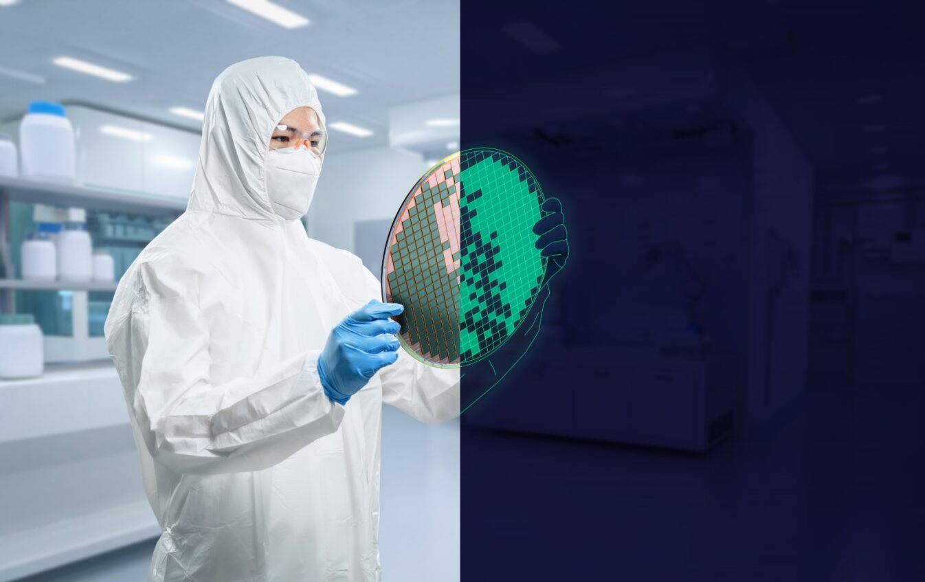 The image shows a person in a protective white full-body suit, including a hood and mask, holding a green silicon wafer with etched patterns in what appears to be a high-tech manufacturing facility or cleanroom environment. The background is slightly blurred, but displays a futuristic-looking interior space with bright overhead lighting. The image's focus and composition highlights the worker inspecting or presenting the silicon wafer, which is a key component used in semiconductor and microchip production.