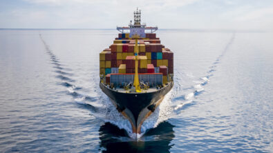 A head-on picture of a cargo ship at sea