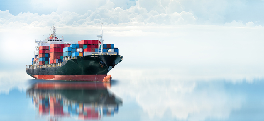 A picture of a cargo ship out at sea