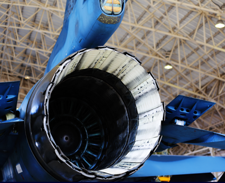 large wind turbine on blue plane