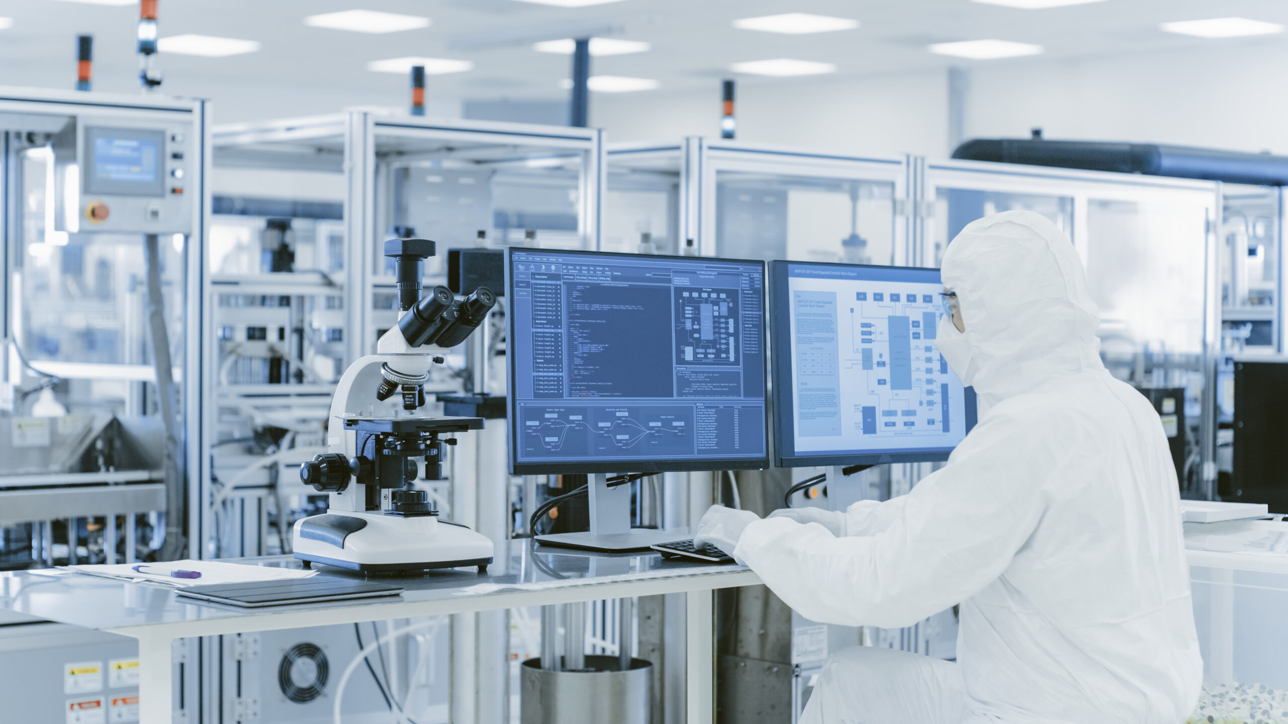 Pharmaceutical engineer working in laboratory on the computer