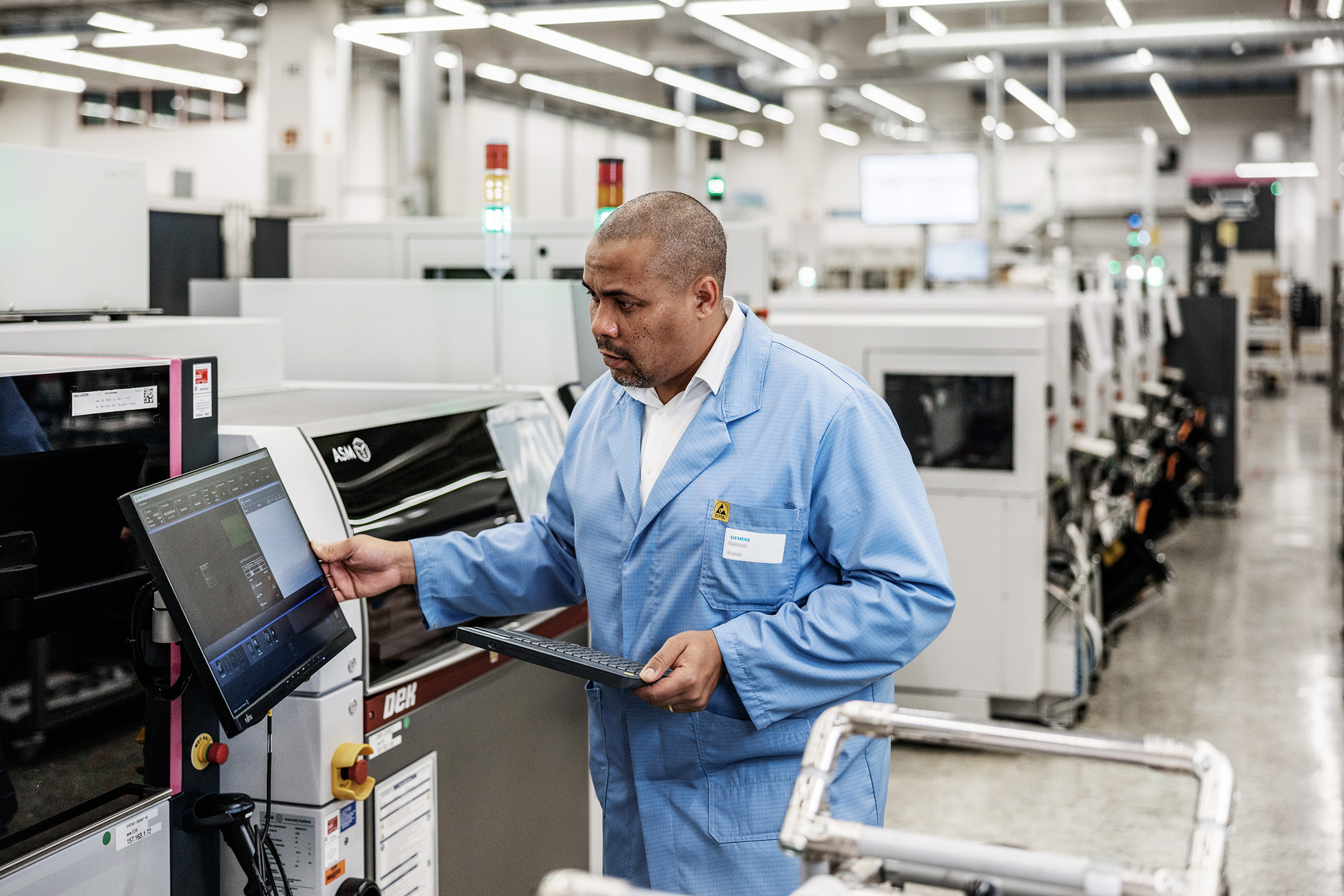 Engineer on PCB manufacturing shop floor