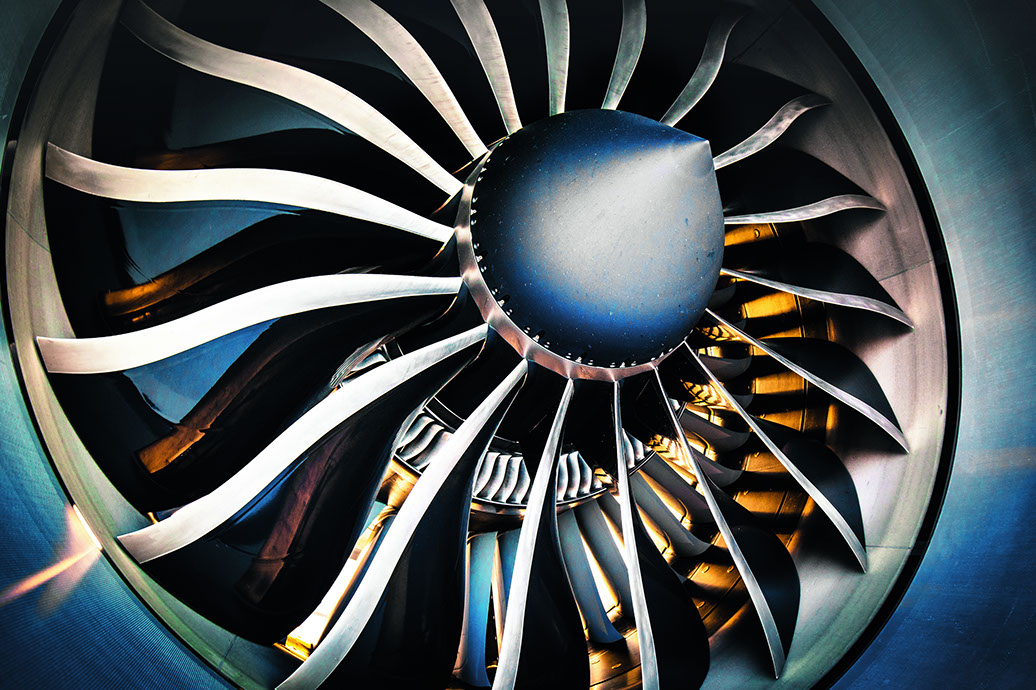 A close-up of an aircraft engine turbine.
