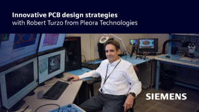 An image of Robert Turzo, a PCB designer, at his desk looking at Siemens software on his computers.