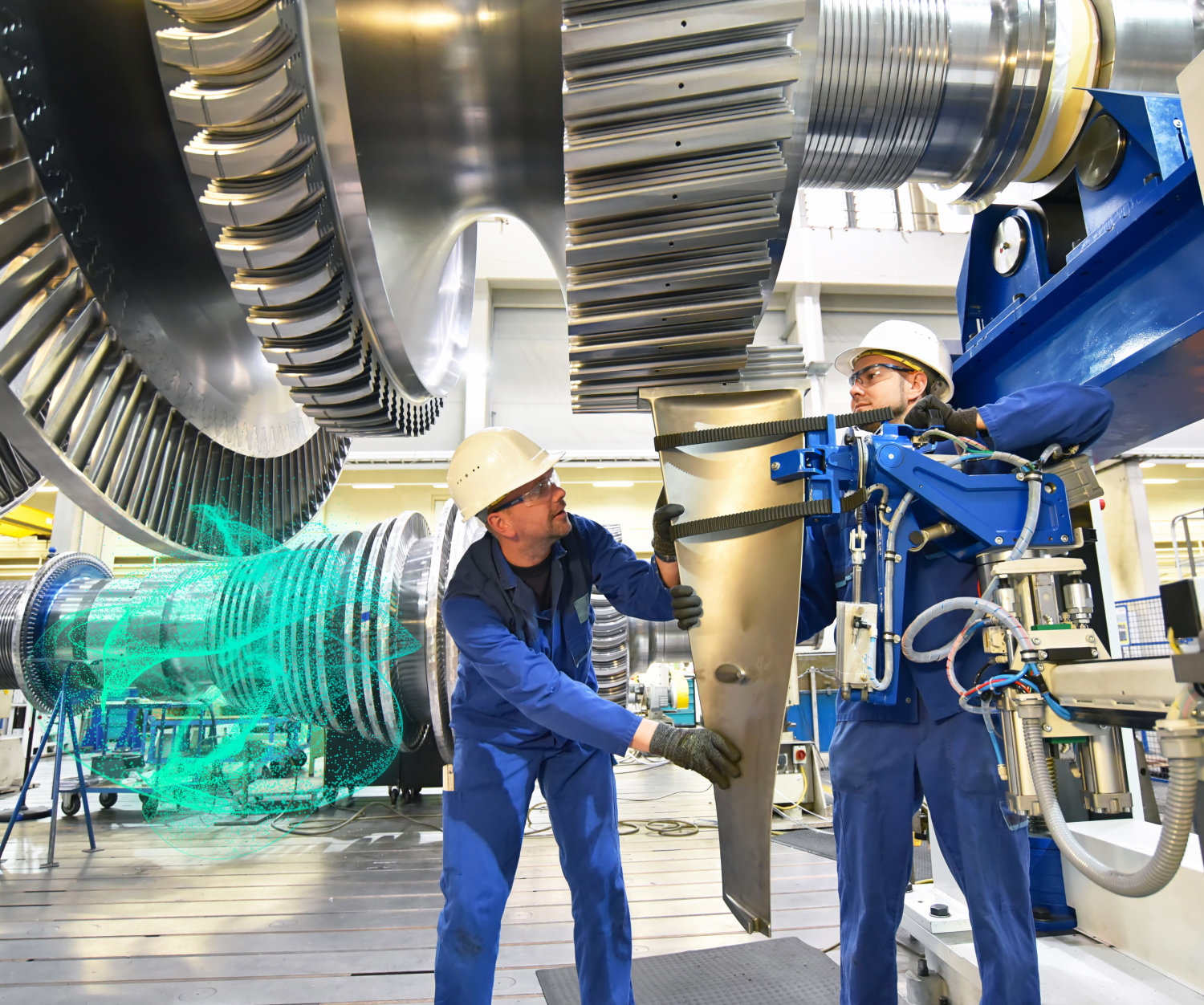 Two engineers in gas turbine manufacturing facility with digital overlay over turbine.