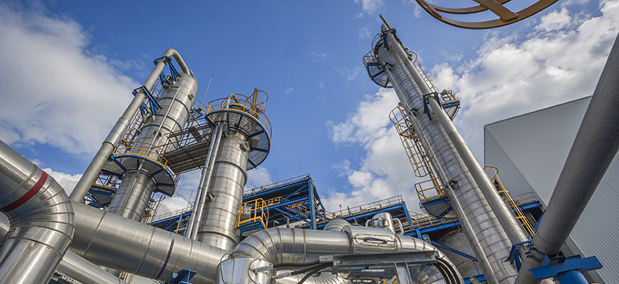 Refinery tower structure in petroleum plant utilizing an executable digital twin to achieve operational excellence in energy and utilities.