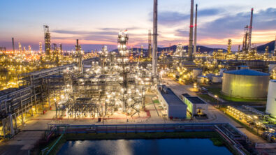 Oil refinery capital project at dusk