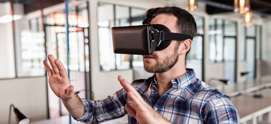 Man using virtual reality technology for startups