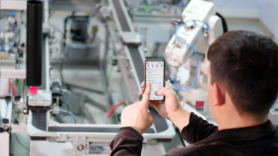 service technician using mobile app of plm connected to crm.
