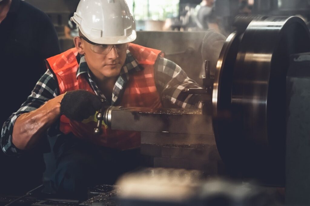 maintenance person working on an asset