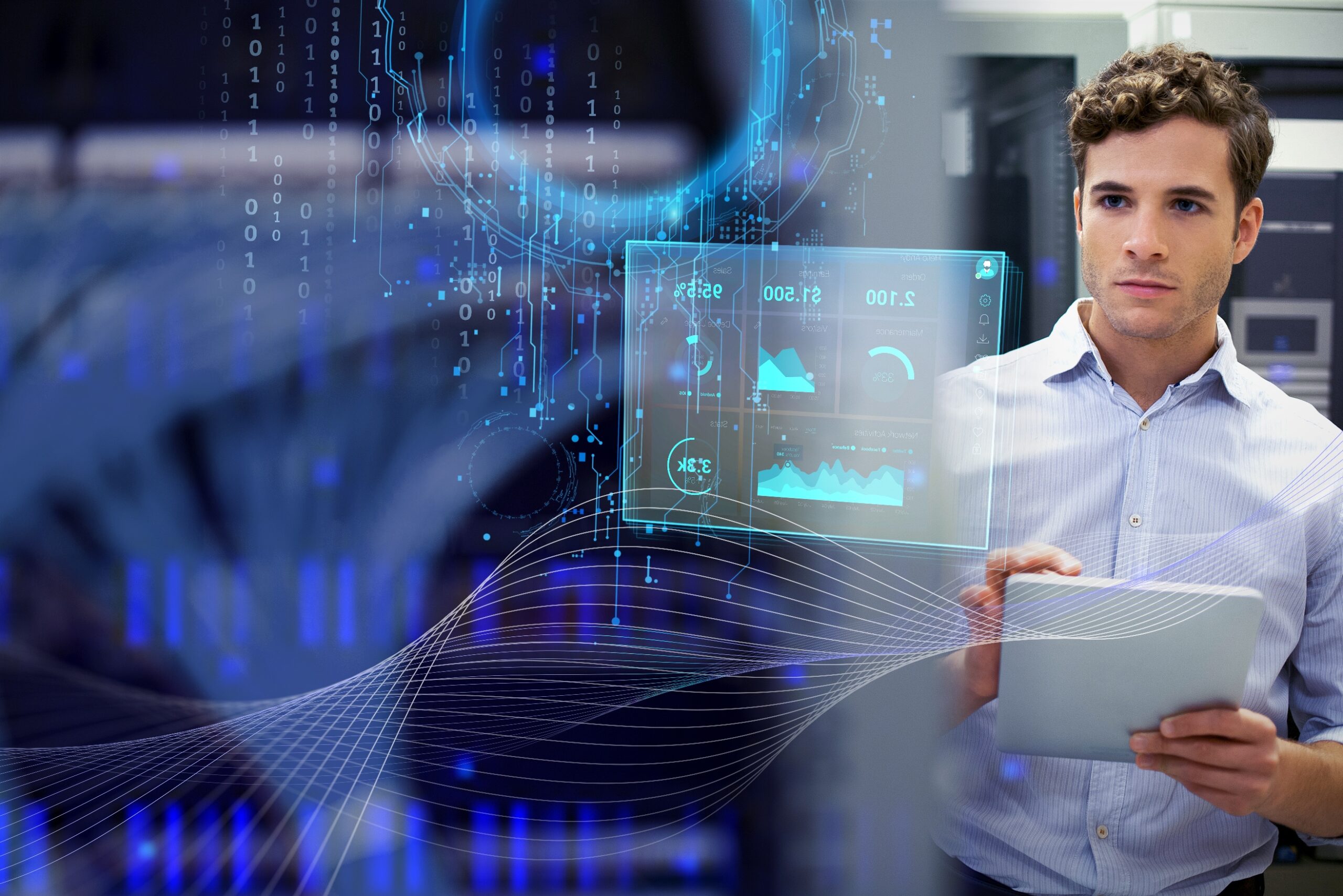 Man with tablet looking at digital charts and graphs overlayed in front of him