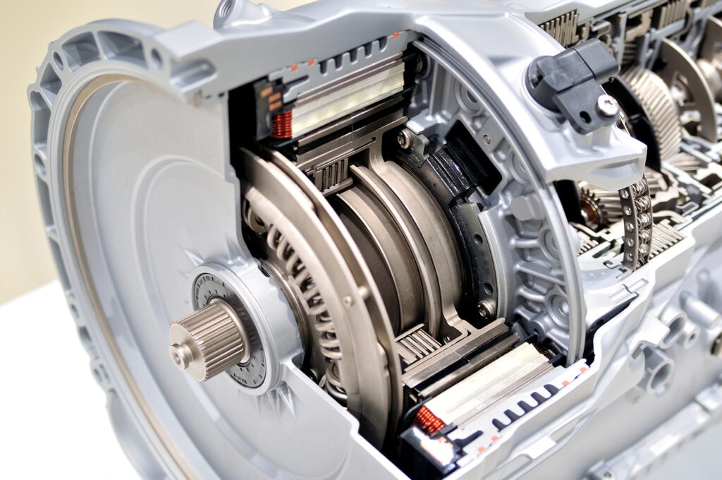 The cross-section view of an automatic transmission shows the torque converter clutch component that is responsible for clutch judder.