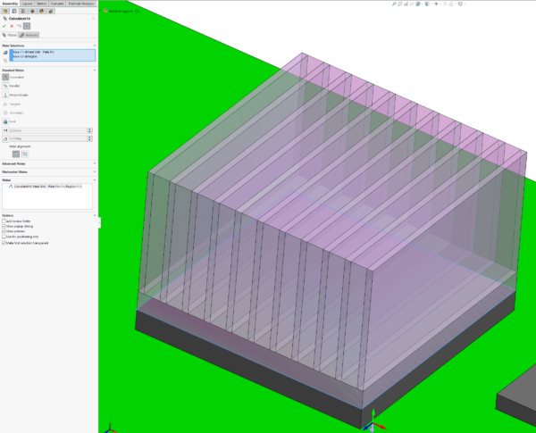 Purple coloured region smartpart placed over heatsink smartpart using mates