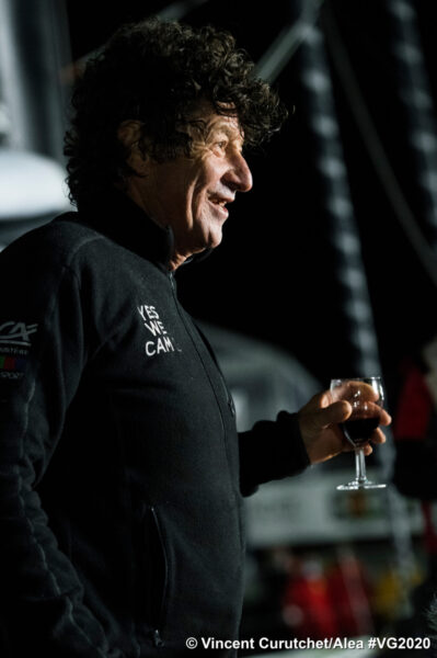 Iconic sailor Jean Le Cam enjoys a glass of red wine to celebrate his arrival in Les Sables d'Olonne, France. He finished 4th in the Vendée Globe race around the world.