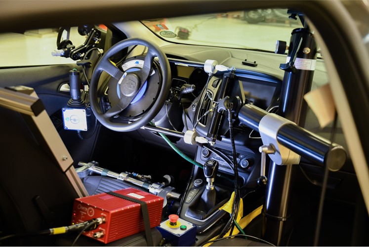 A typical setup for capturing the vehicle dynamics characteristics of the vehicle, including Inertia measurement unit and steering robot
