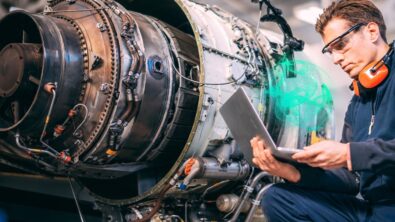 Engineer using a jet engine digital twin