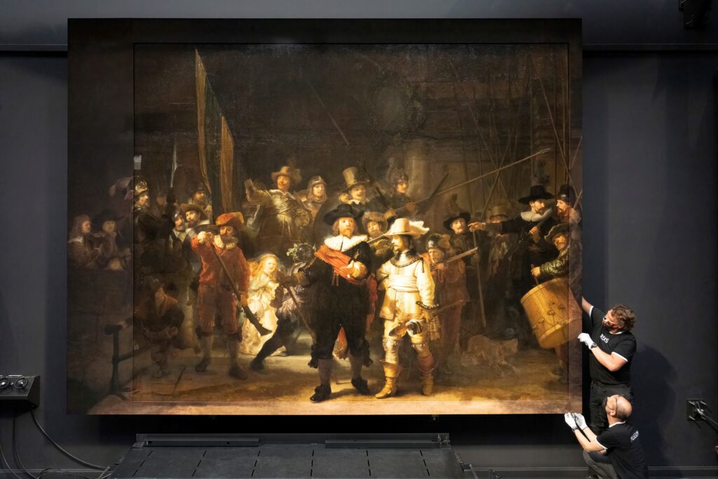 The Night Watch by Rembrandt with the digitally printed missing pieces was briefly displayed at the Rijksmuseum.