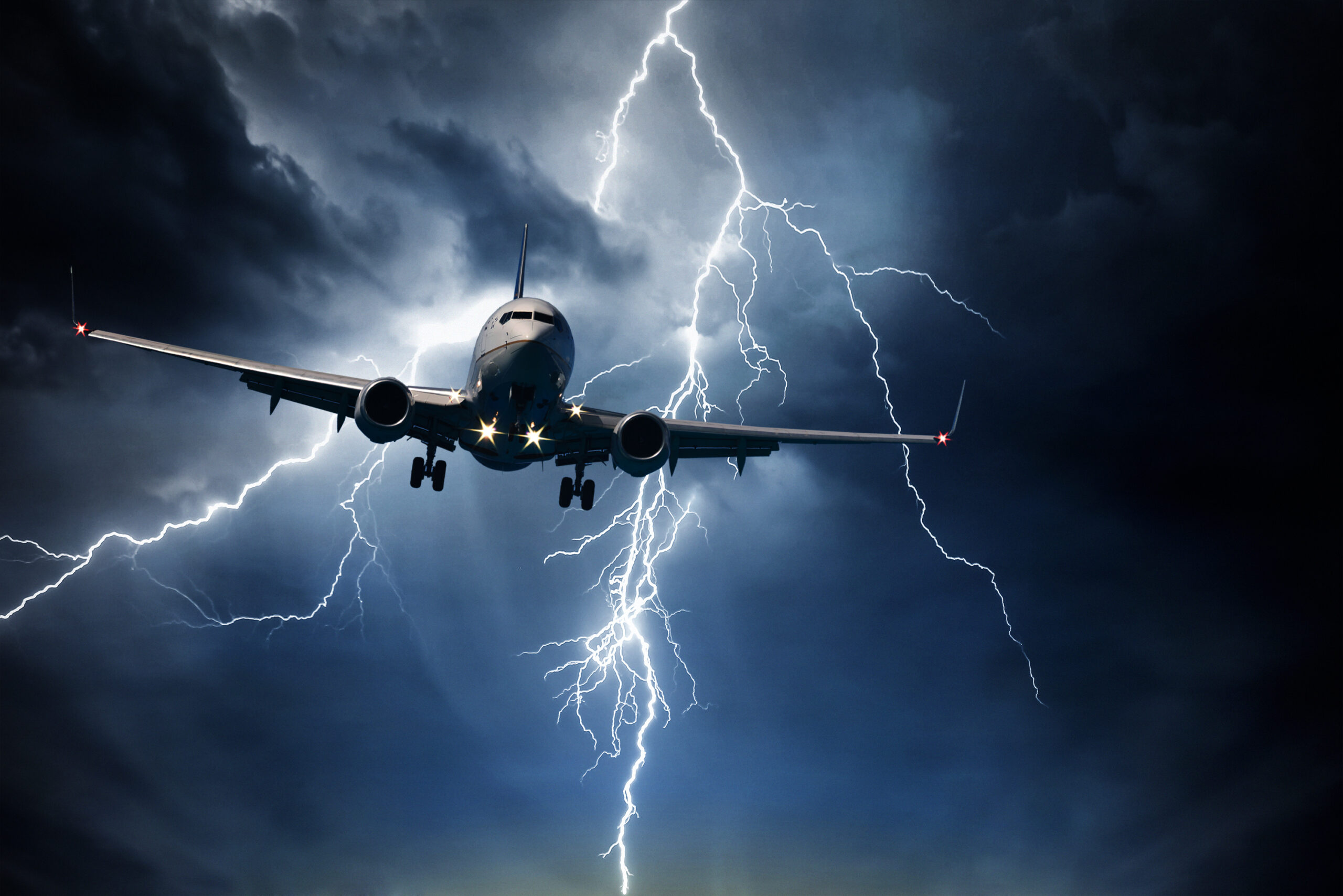 Aircraft travelling through stormy sky