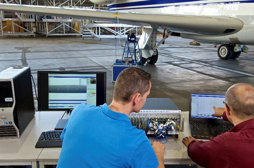 Engineers preparing ground vibration testing