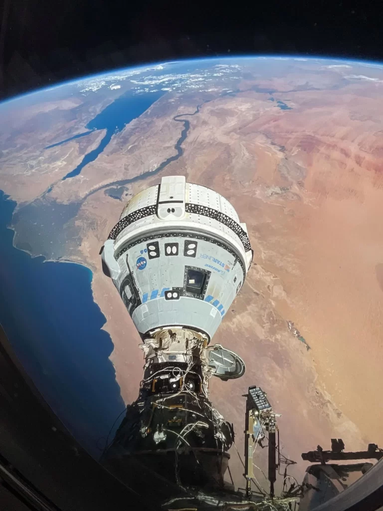 The Starliner spacecraft on NASA’s Boeing Crew Flight Test is pictured docked to the Harmony module’s forward port as the International Space Station orbited 263 miles above the Mediterranean Sea. Photo credit: NASA