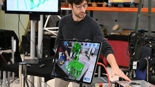 Engineer viewing an executable digital twin combining simulation in real time with physical testing.