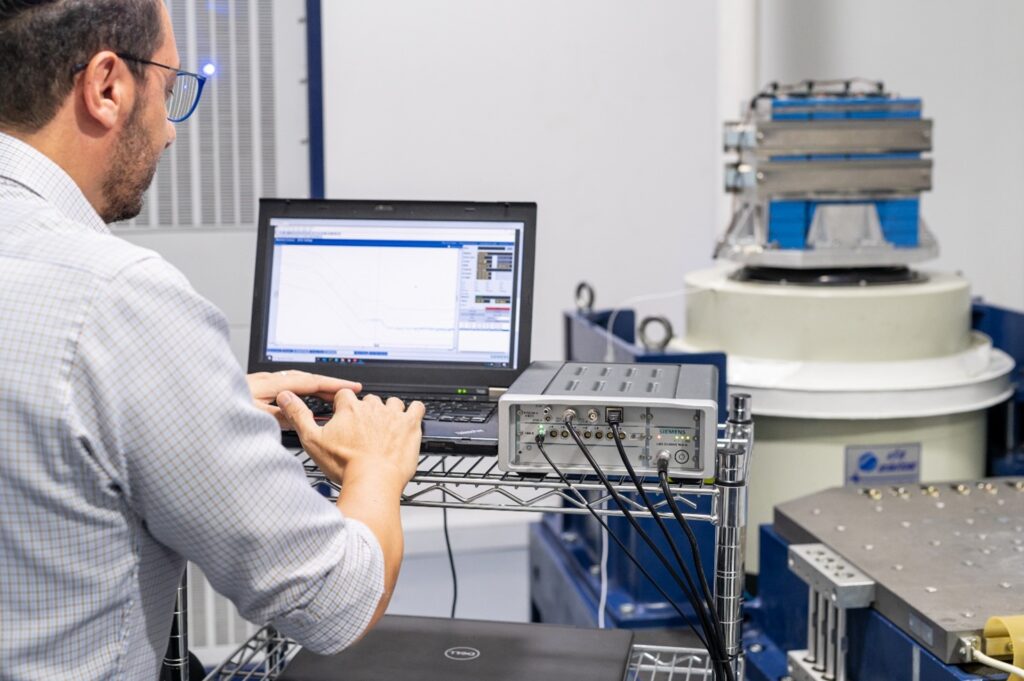 Space engineer testing battery pack to de-risk spacecraft qualification