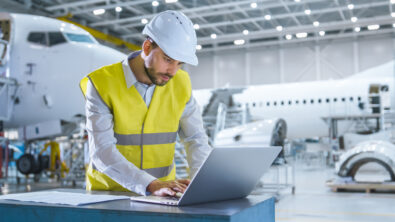 manufacturing engineer using MBOM in aerospace factory