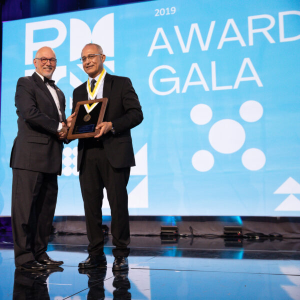 Al Zeitoun receiving PMI fellow award.