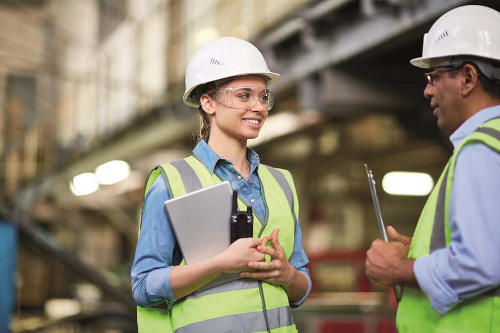 Two happy people working in Manufacturing to show ease of use with Easy Plan 