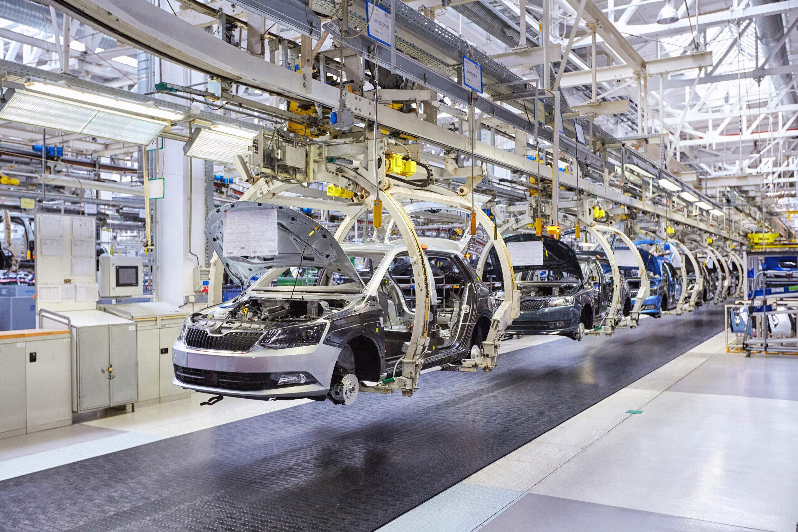 Cars are manufactured on a production line by robots