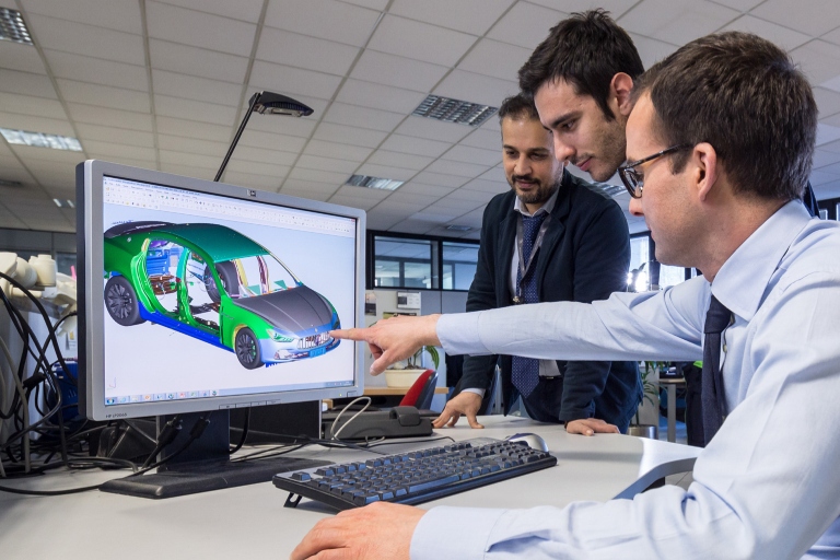 Design engineering team working on new automotive product