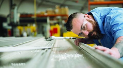 Man working on a sheet metal design